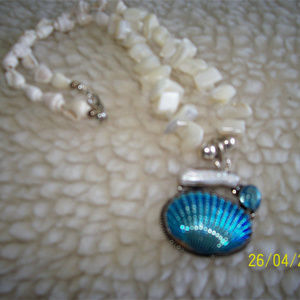 Collection by jadaskye' ”  Titanium Shell Necklace